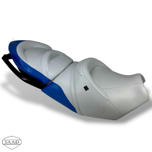 A new seat cover designed for a Sea-Doo GTX personal watercraft. The cover is primarily gray with blue accents and appears to be form-fitting with a diamond stitch pattern.